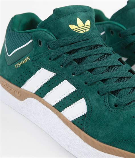 adidas green sneakers.